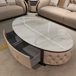 Oval White Marble Coffee Table with Cream Tufted Leather Sides and Two Drawers
